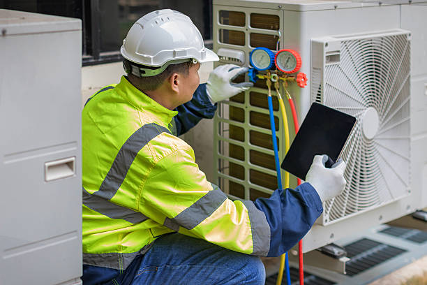 Professional Air Duct Cleaning technician working in Woodstock, CT